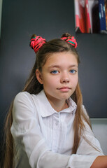 Teenager girl with colored pigtails