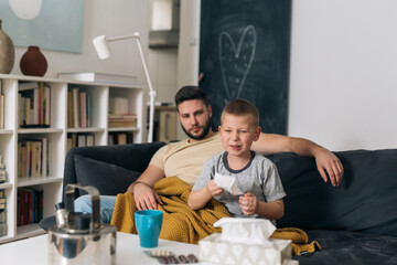 father and son catch a cold.