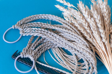 Hair accessory elastic band with braids in natural light color