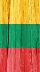 Flag of Lithuania on dry wooden surface, cracked with age. Vertical background or mobile phone wallpaper with Lithuanian national symbol. Light pale faded paint on old wood. Hard sunlight with shadows