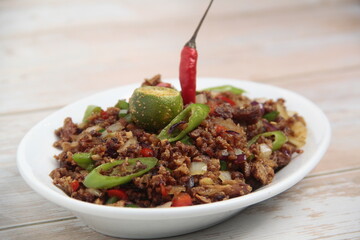 reshly cooked Filipino food called Pork Sisig