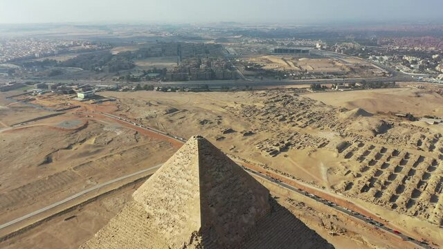 Aerial shot of the top of Khafre and 3 pyramids and tombs in Giza, Egypt