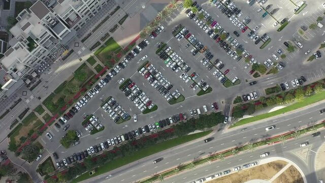 Aerial drone shot revealing parking lot in Business Bay, Dubai