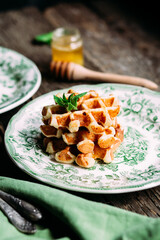 cottage cheese waffles with honey on a plate