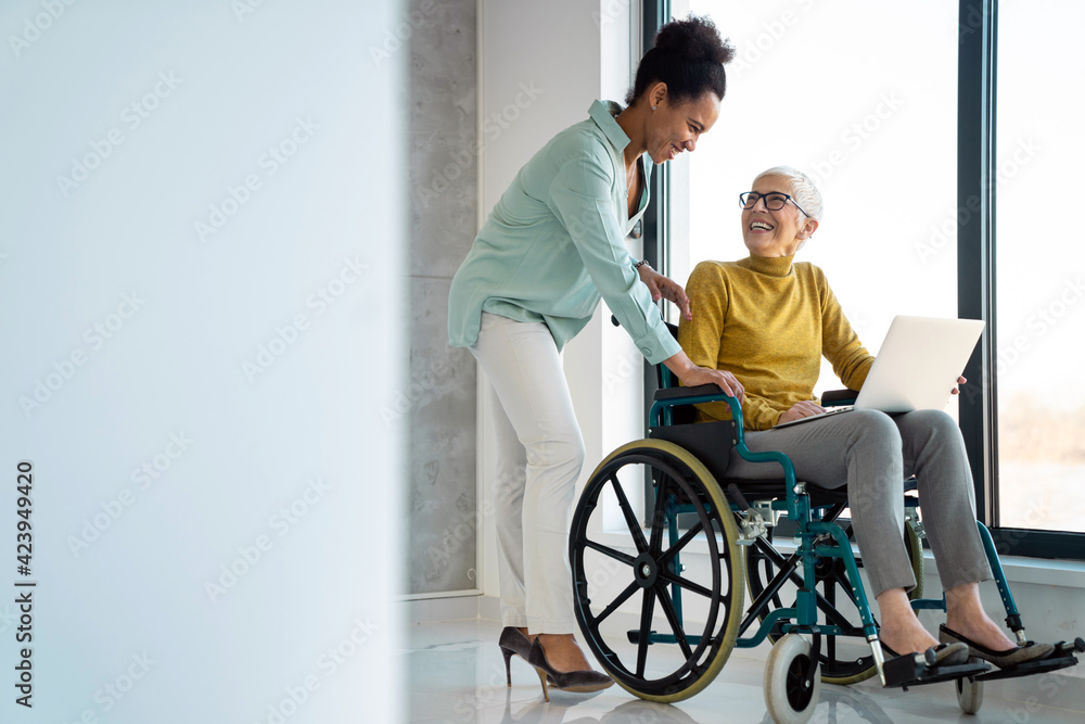 Wall mural business people with disabiliy working on new project together in office