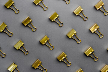 Paper binder clips pattern, copy space. Office supplies background