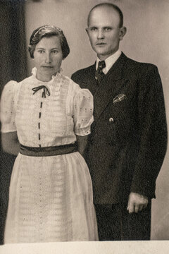 Germany - CIRCA 1930s: Shot of married couple standing in studio. Vintage Carte de Viste Edwardian era photo