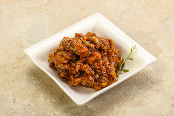 Canned anchovy in tomato sauce