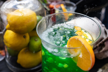 Multicolored alcoholic and non-alcoholic cocktails with straws