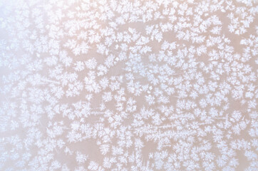 Snowflakes on rusty metal plate close up. Soft focus and blurred. Winter background. Snow texture.
