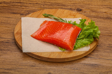 Salmon piece steak served rosemary