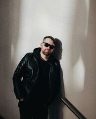 man wearing leather jacket