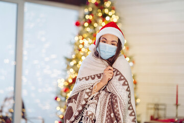 The girl waves her hand to the camera on New Years Eve.