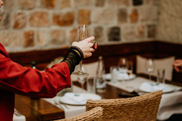 Fototapeta na wymiar wineglass winetasting on weddingday cheers bride and groom rings