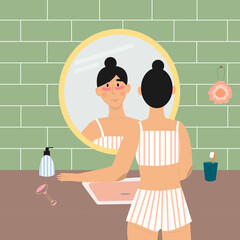 Cute girl in pajamas in the bathroom with reflection in the mirror, with patches under her eyes. Facial massager, body sponge, soap bottle. Morning and evening routines.
