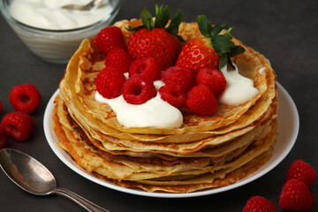 Russian cuisine national dish bliny with fresh berries