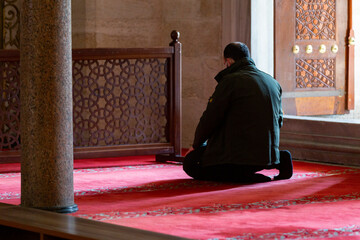 Turkey. Istanbul. Islamic traditions. A Muslim performs a prayer in a mosque.
