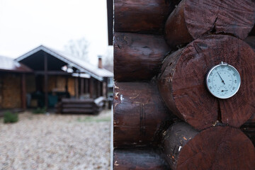 carved platbands on the windows. decorative decoration with wooden ornaments of window shutters. country house in a traditional style