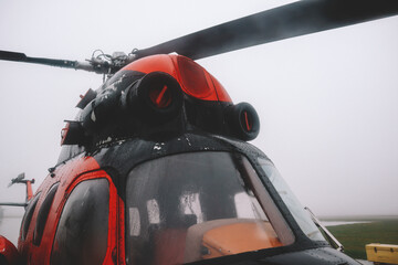 A small airfield with airplanes. Aircraft details. Old helicopters