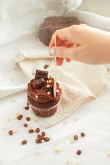 Chocolate cupcake. Delicious Mother's Day, caramel cake