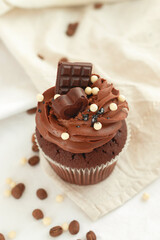 Chocolate cupcake. Delicious Mother's Day, caramel cake