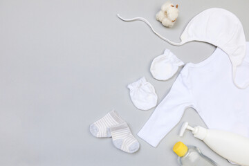 Baby concept. Baby cloth and goods on grey  background. Place for text. View from above. Flat Lay - Image