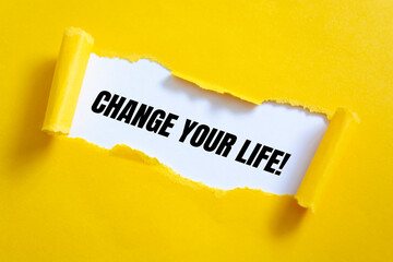 change your life, text on white paper on torn paper background