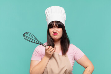 pretty chef woman sad expression
