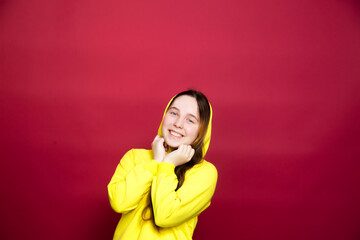 Photo shot of beautiful positive smiling brunette teen girl
