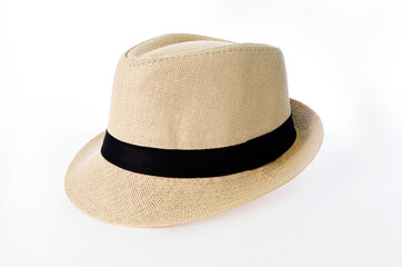 Panama style hat. Straw material with black fabric tape. Isolated on white background.