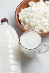 Natural farm products. Bottle and glass of cow's milk