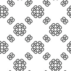 Geometric vector pattern with triangular elements. Seamless abstract ornament for wallpapers and backgrounds. Black and white colors. 