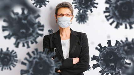 woman in medical face protection mask indoors on blue background