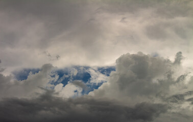 Dark storm clouds in the sky. Dark gray dust clouds