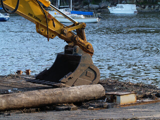 Construction equipment on pontoons nears Dangar Island
