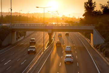 Costanera Norte highway in Vitacura district of Santiago de Chile at sunset.