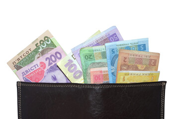 Ukrainian money hryvnia  of all denominations - 1,2,5,10,20,50,100,200, 500 banknotes (bills) in leather wallet. Isolated on white background. UAH. Money and financial concept
