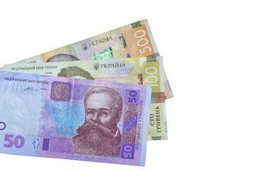 Ukrainian money - 50, 100,  500 new banknotes hryvnia isolated on white background  with free space for your text. Money and financial concept. Flat lay, top view