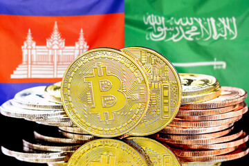 Concept for investors in cryptocurrency and Blockchain technology in the Algeria and Saudi Arabia. Bitcoins on the background of the flag Algeria and Saudi Arabia