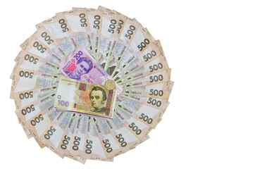 Circle of ukrainian money - 500 banknotes hryvnia and two stacks  of 100 and 200 banknotes (bill ) and coin isolated  on white background with free space for  text. Money concept. Flat lay, top view