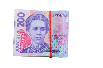 A pile of ukrainian money on a 200 hryvnia isolated isolated on white background. UAH. Free copy space. Business and finance concept. Top view