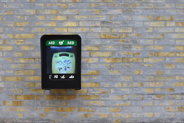 Defibrillator AED Cabinet Box with Window on wall in outdoors