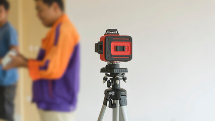 Laser level measuring tool Construction area background