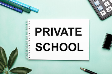 PRIVATE SCHOOL is written on a white sheet on a blue background near the stationery and the...