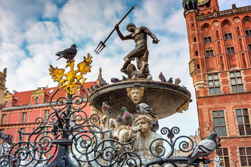 Fototapeta na wymiar Fountain of the Neptune in old town of Gdansk, Poland