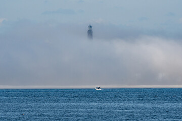 fog bank in front of lighthouse