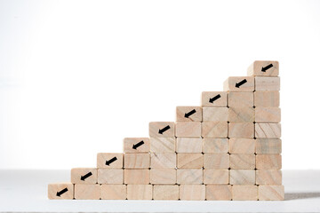 Fototapeta premium stairs and growth concept; toy wood blocks make a step stairs isolated on white background with copy space for your