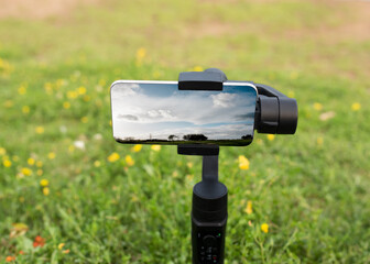 Phone on tripod taking photo of usual rural England landscape in Yorkshire