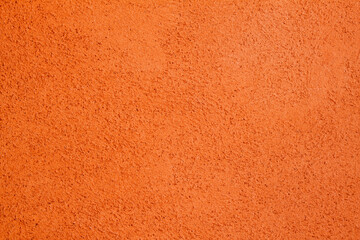 Orange plaster finish wall texture