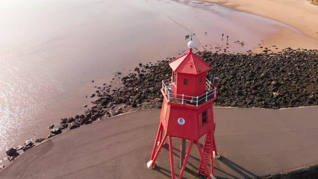 Orbiting around The Groyne lighthouse on South Shields beach, a seaside town near Newcastle upon Tyne.